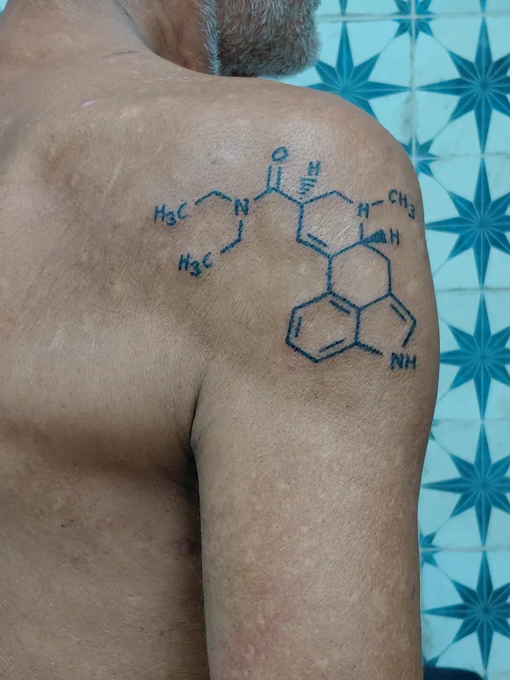 Chemical structure of a molecule on the shoulder