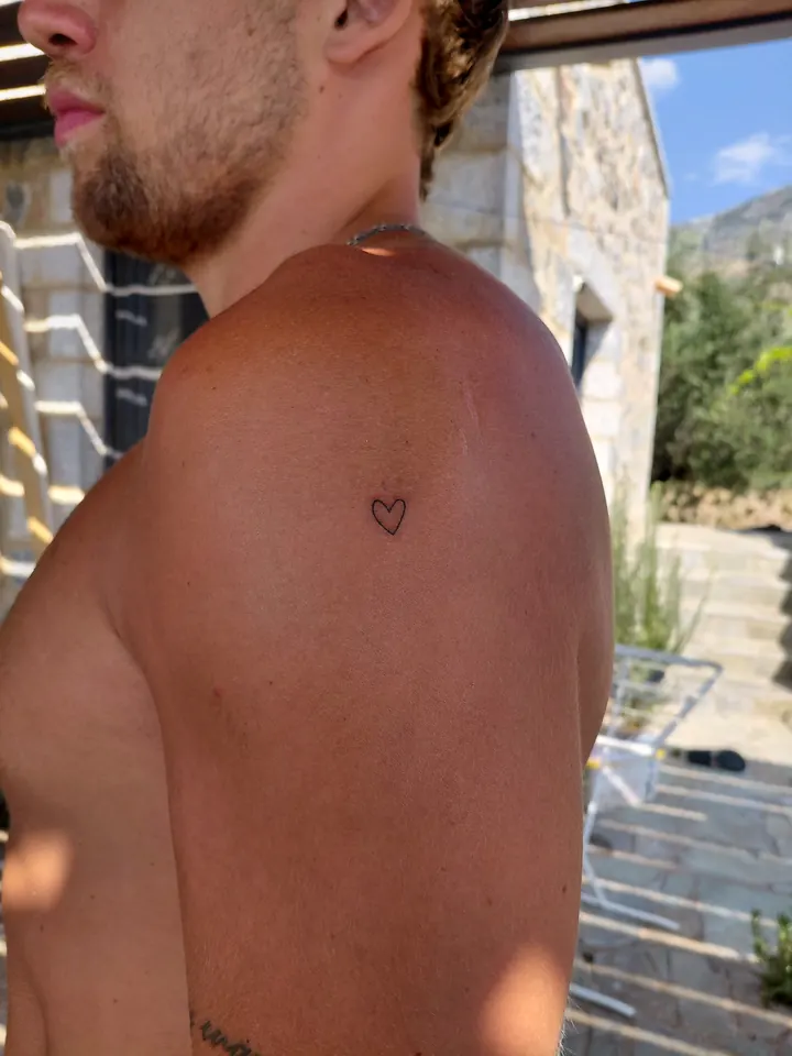 Tiny heart on the shoulder blade